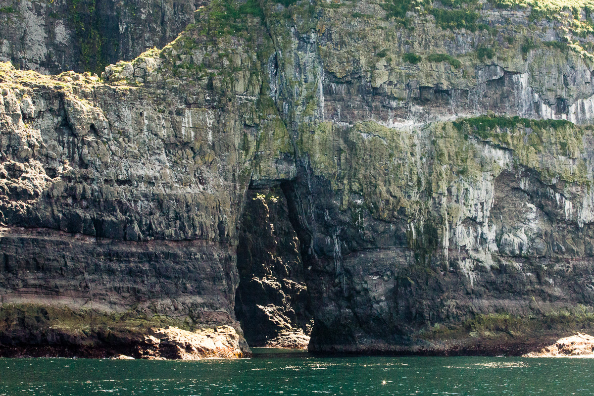 Opening in massive rock formation near Vestmanna, Faroe Islands - Blurbomat.com