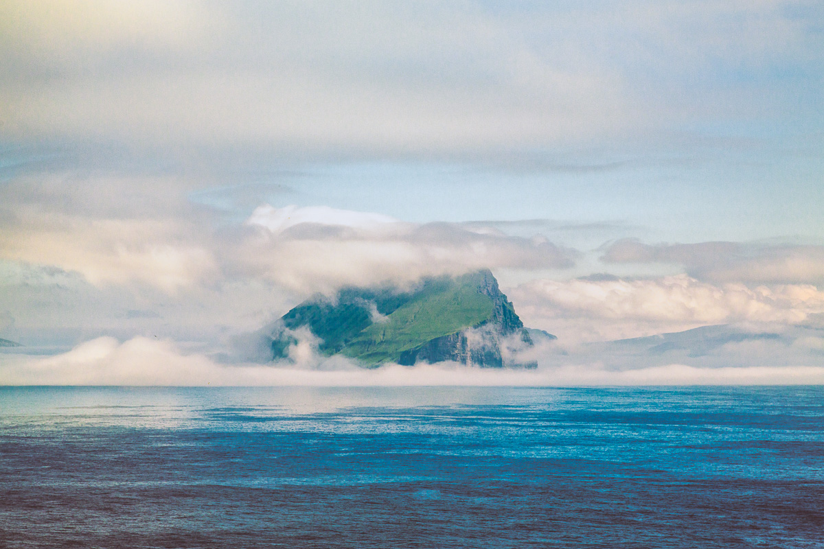 Clouds surround one of the Faroe Islands - Blurbomat.com
