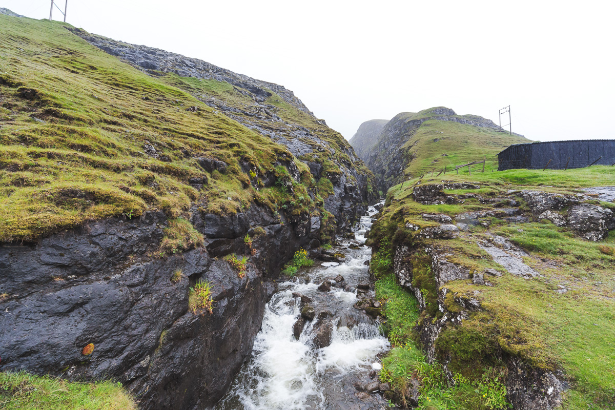 Rainy waterfall near Leypannagjogv, Faroe Islands. by Jon Armstrong for Blurbomat.com.